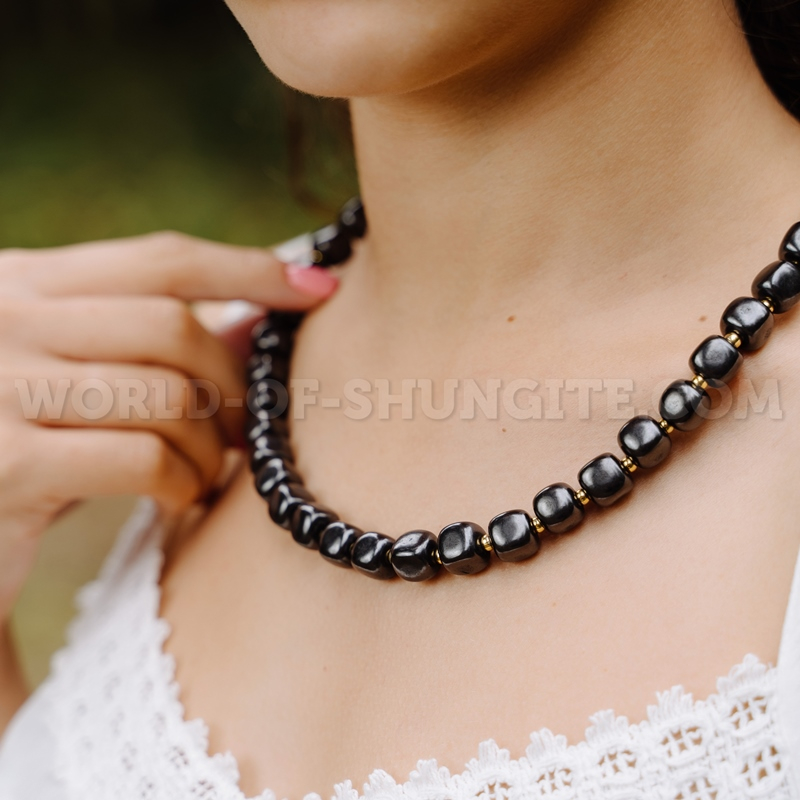 Shungite necklace "Pellet cubes" with goldish glass beads