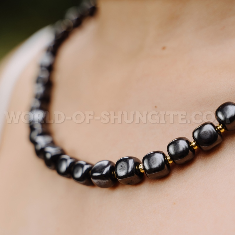 Shungite necklace "Pellet cubes" with goldish glass beads