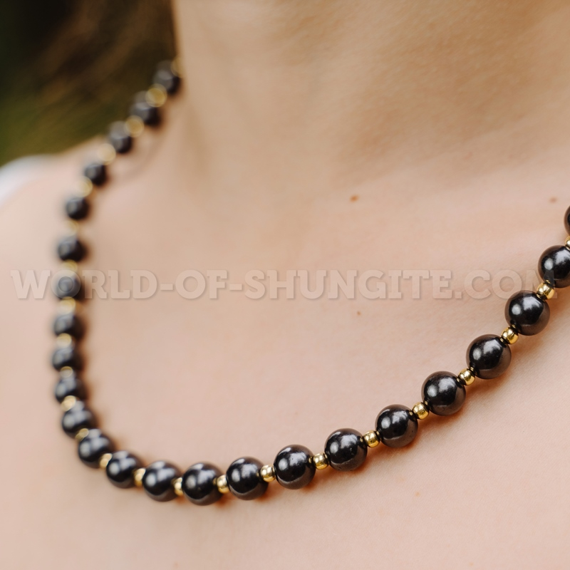 Shungite necklace with goldish glass beads