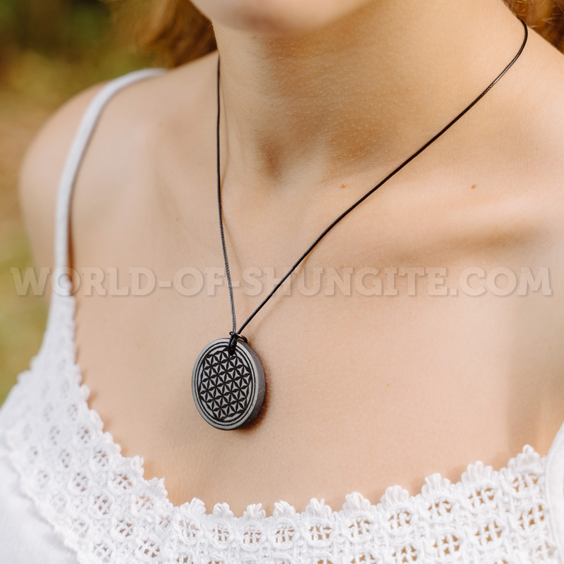 Shungite pendant "Flower of life" (circle) with laser engraving from Karelia