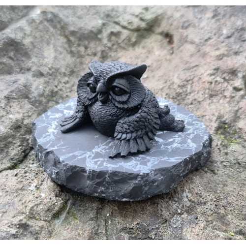The figure lying owl