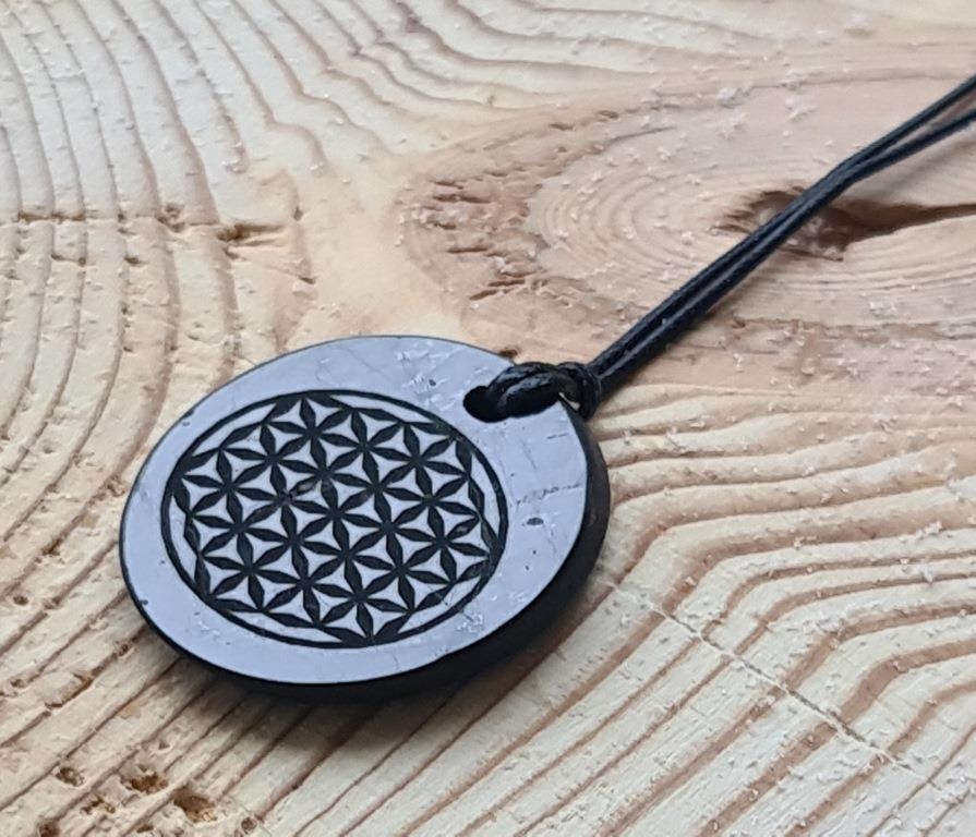 Shungite pendant "Flower of life" (oval) with laser engraving