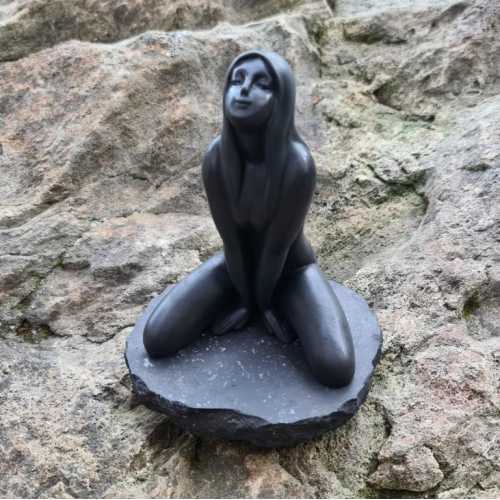 The figure Mermaid on Sun