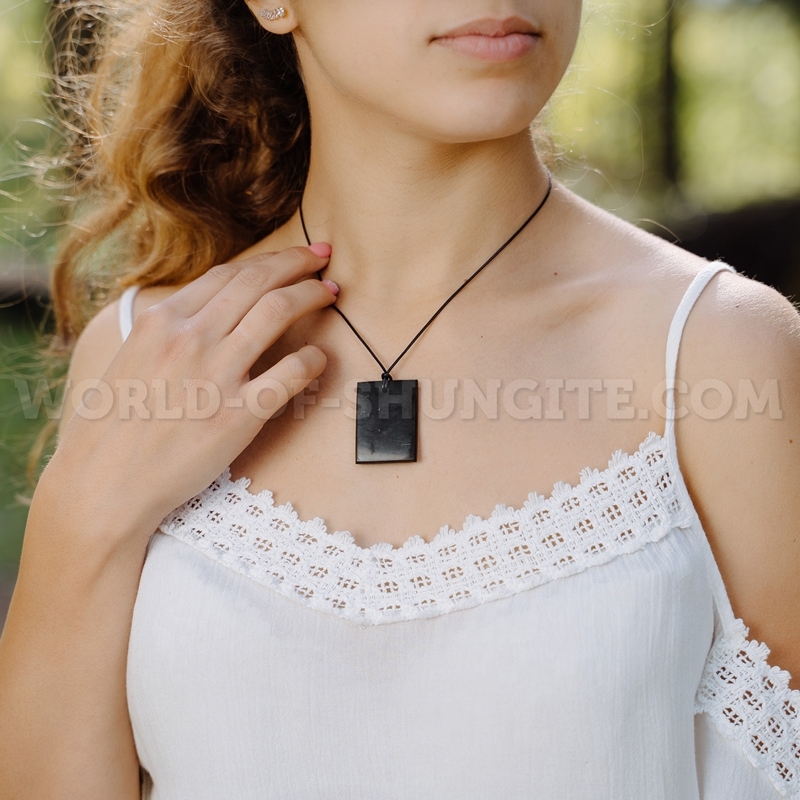 Rectangle pendant made of shungite with individual engraving