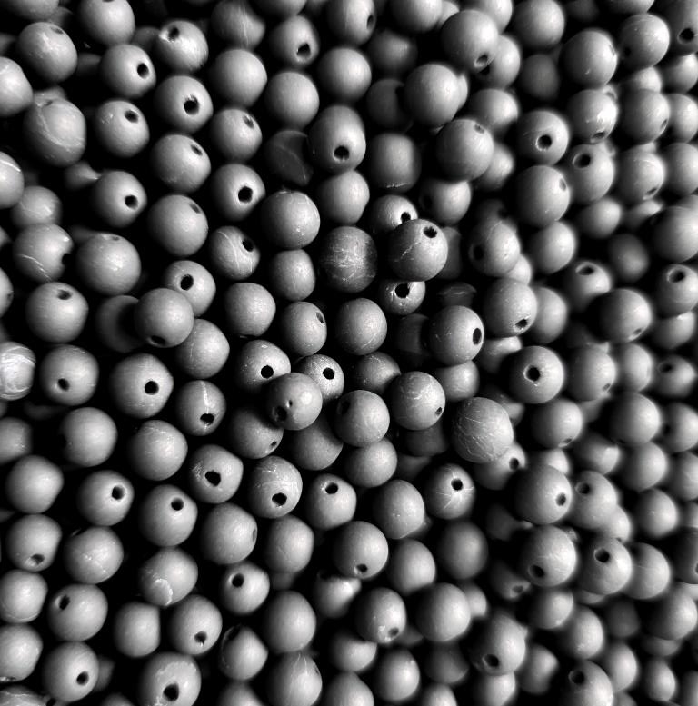 Placer of beads 10 mm (unpolished beads with holes)