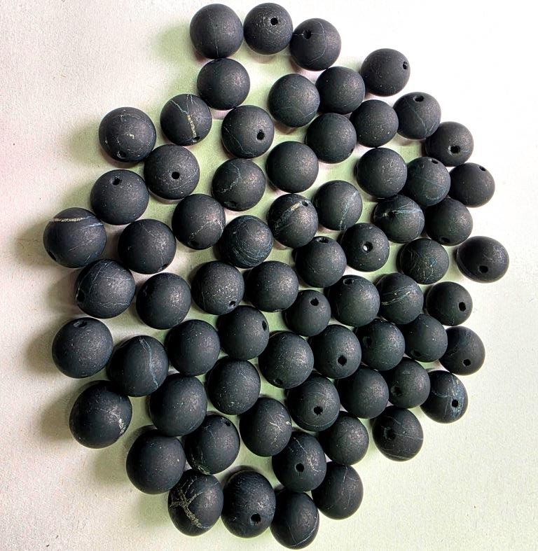 Placer of beads 10 mm (unpolished beads with holes)